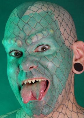 Lizardman Tattoo On Face.